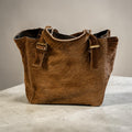 Black brown hair-on genuine cowhide leather tote with leather straps and brass hardware