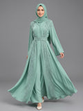 Woman wearing the Celeste embellished belted abaya in dusty rose