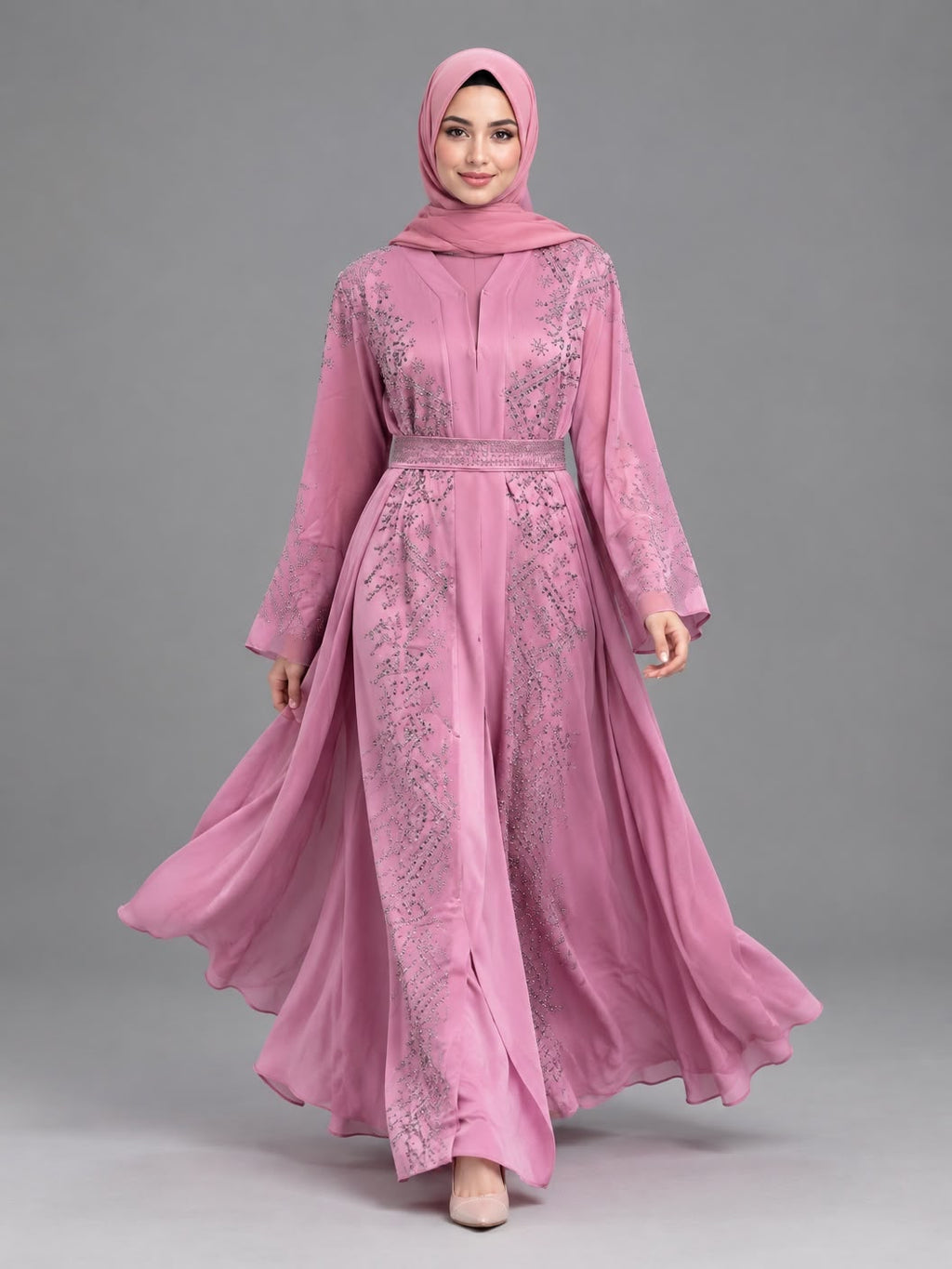 Woman wearing the Celeste embellished belted abaya in sage green