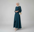 Model in navy modest maxi dress with hijab