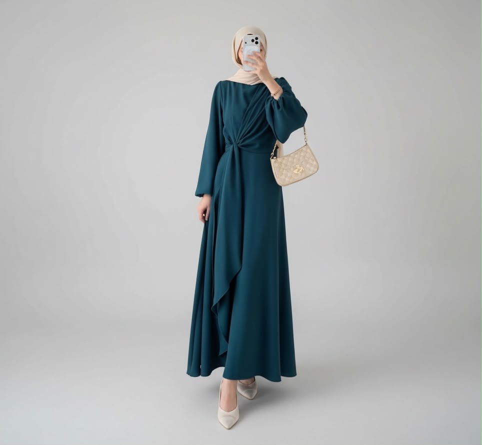 Model in navy modest maxi dress with belt detail