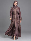 Model wearing beaded mauve open abaya with gold embroidery and matching self-tie belt