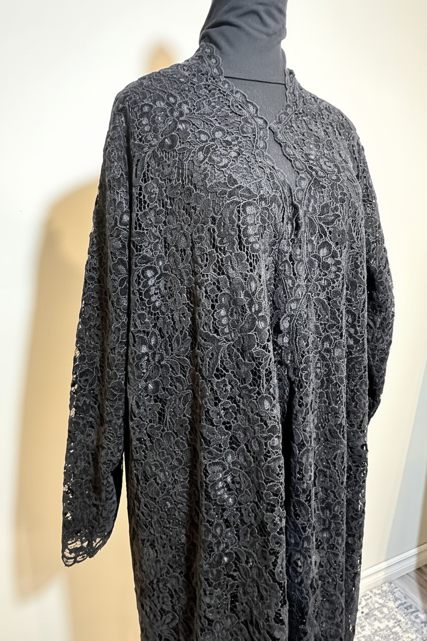 Black lace abaya side view, white background