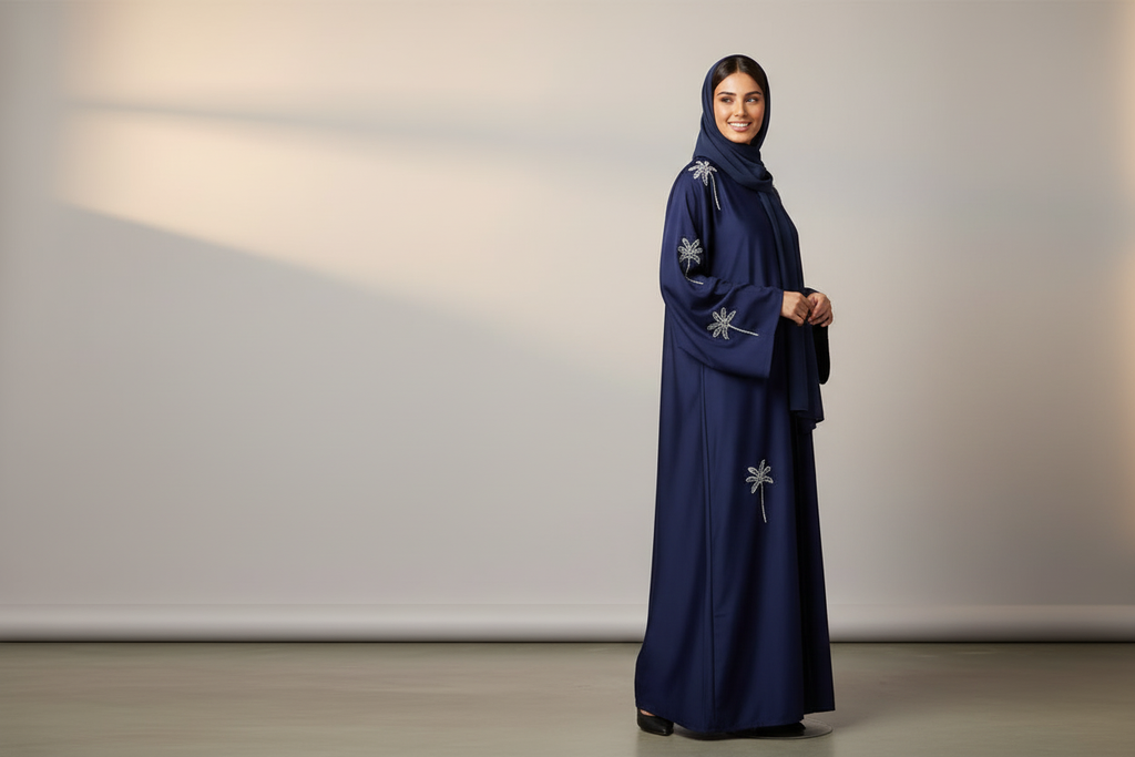 Navy embroidered abaya on model in an alternate pose